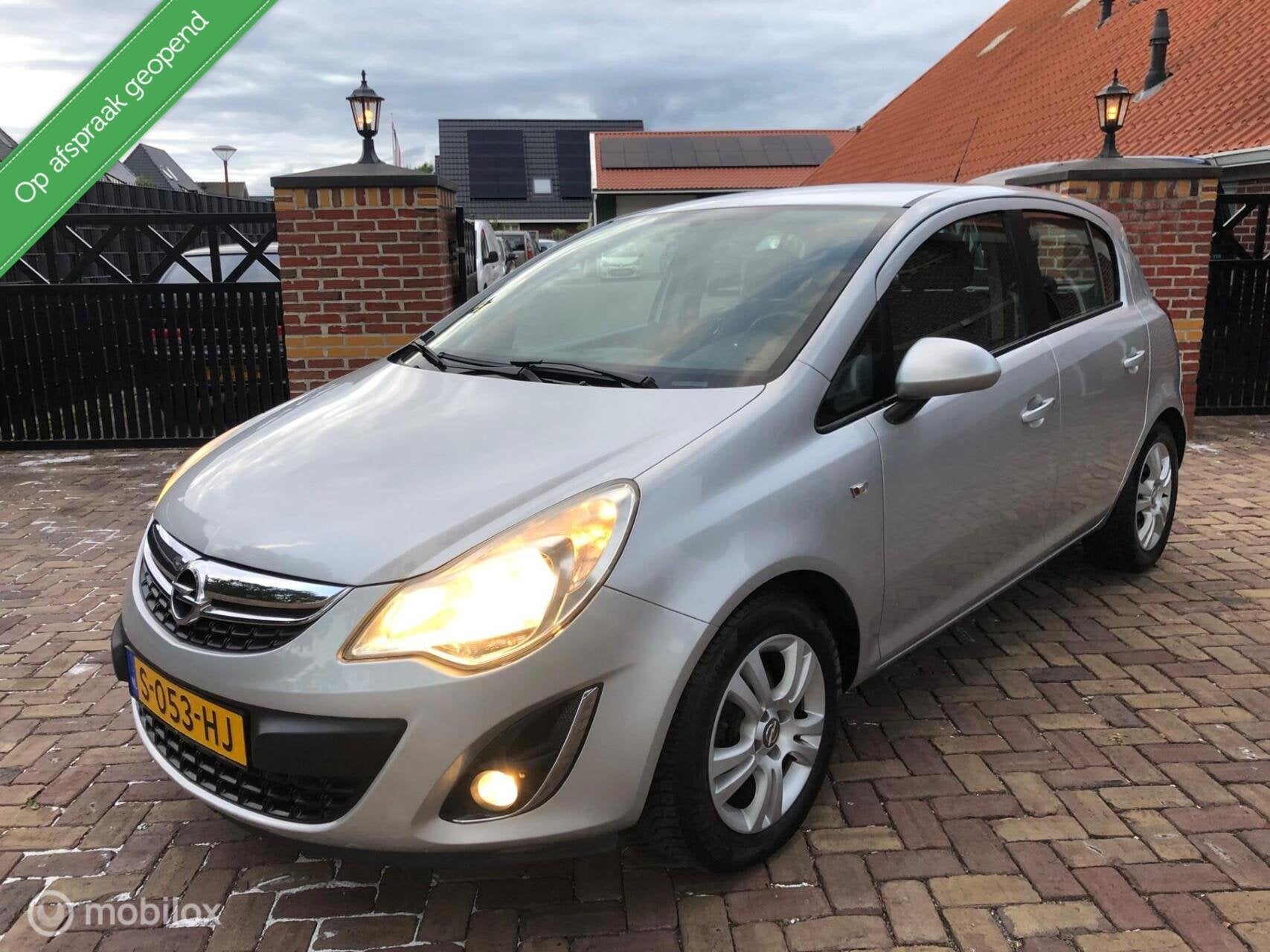Opel Corsa 1.2 Anniversay Edition Airco Cruise Facelift, Voorwielaandrijving, Euro 5, Gebruikt, 4 cilinders
