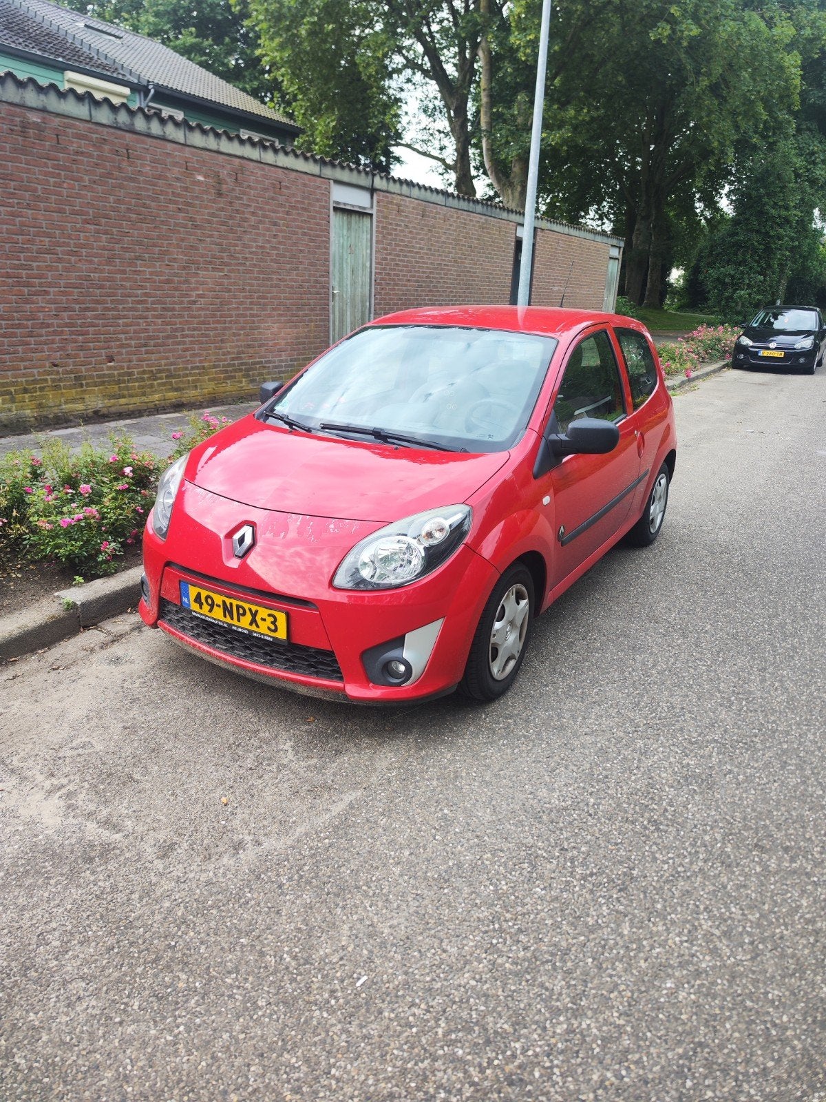 Renault Twingo 1.2 16V 2010 Rood, Auto's, Renault, 839 kg, Zwart, 4 cilinders, 4 stoelen