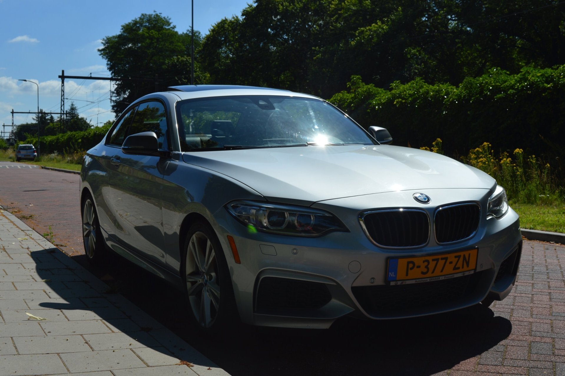 BMW 2-serie Coupé M235i Centennial High Exe schuifdak, Auto's, Automaat, Achterwielaandrijving, Gebruikt, 327 pk