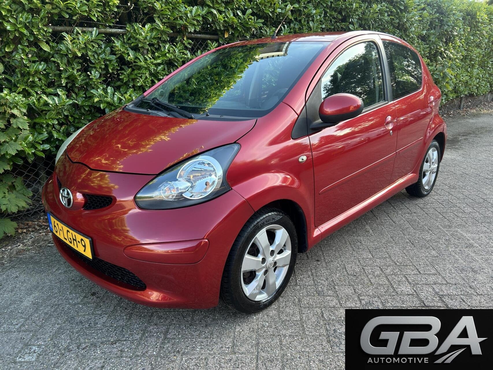 Toyota Aygo 1.0-12V Aspiration Green Half Leder APK 17-06-27, Voorwielaandrijving, Gebruikt, 4 stoelen, Metallic lak