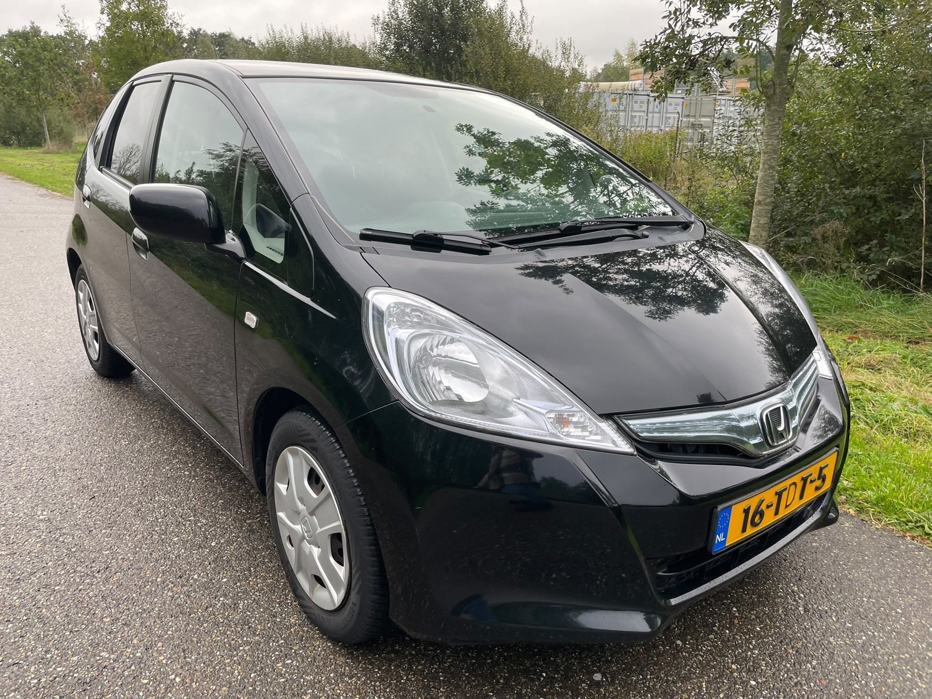 Honda Jazz 1.4 Hybrid Business Mode, Auto's, Euro 5, Gebruikt, 4 cilinders, Origineel Nederlands