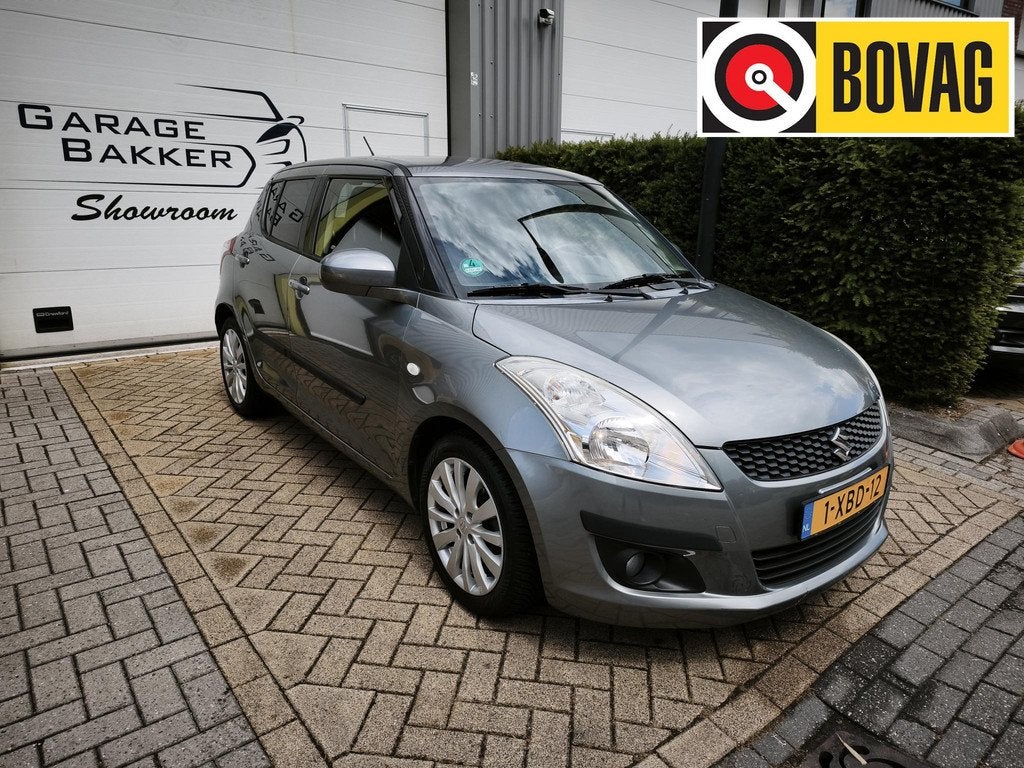 Suzuki Swift 1.2 Exclusive EASSS Airco Cruise-Control Stoelv, Voorwielaandrijving, Euro 5, Stof, Gebruikt