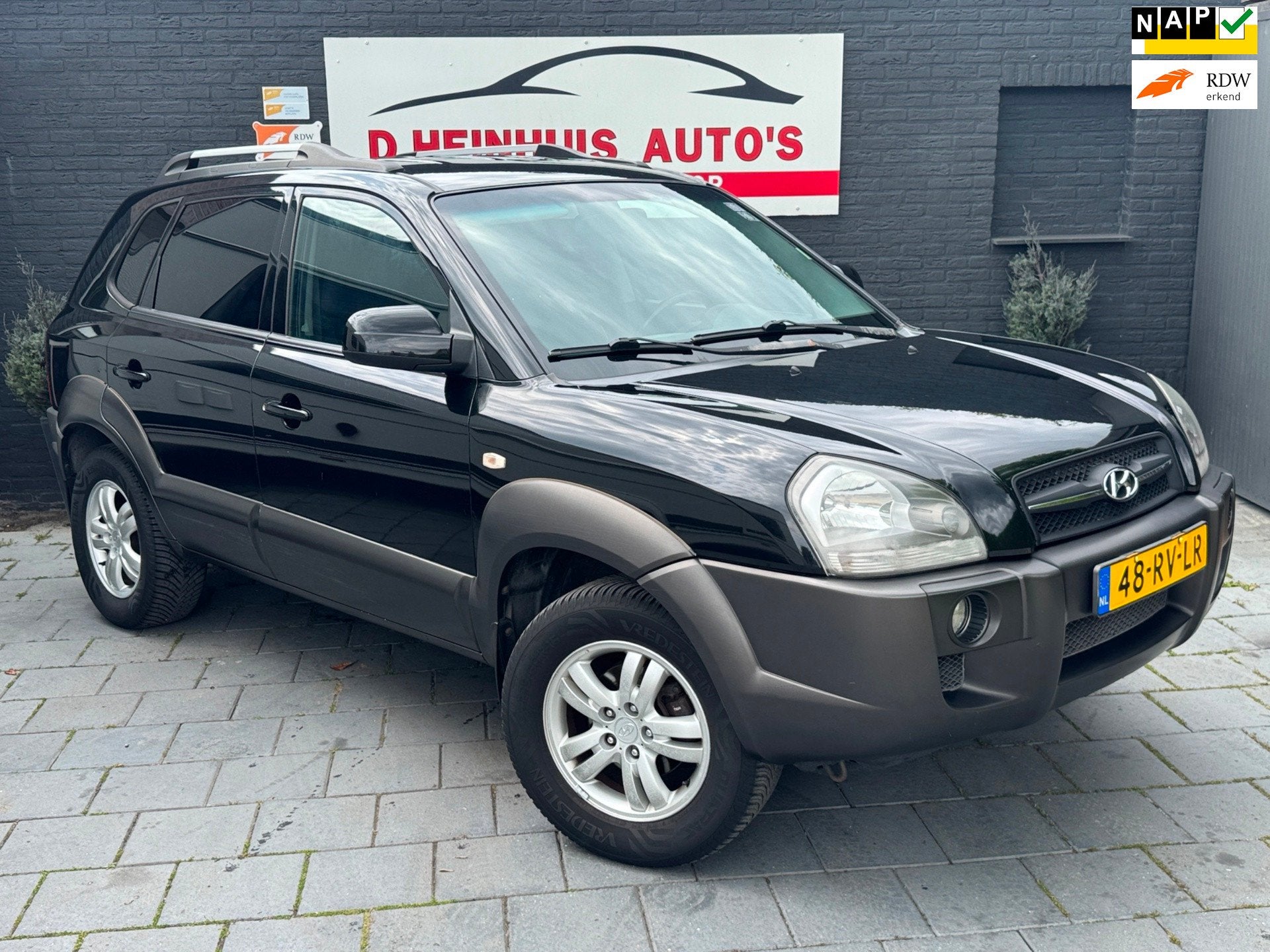 Hyundai Tucson 2.0i Dynamic, Stof, Gebruikt, Zwart, 4 cilinders