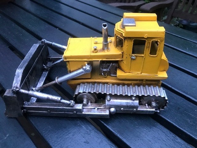 curiosa: prachtige blikken bulldozer, Ophalen of Verzenden