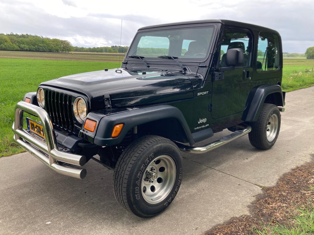 Jeep Wrangler 4.0i Sport Aut. - Rugged Ridge - origin. NL -, Auto's, Jeep, Automaat, 450 kg, 4 stoelen, 1920 kg