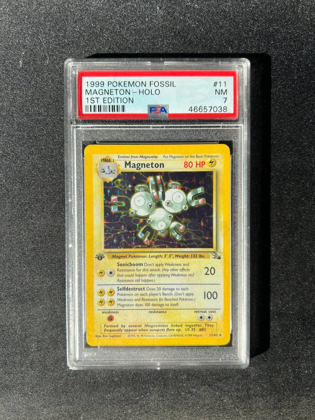 Magneton 11 Holo 1st Edition PSA 7, Ophalen of Verzenden, Nieuw, Losse kaart, Foil