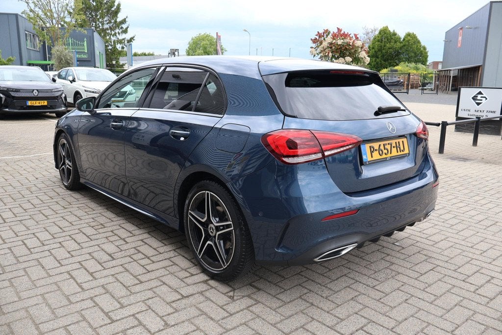 Mercedes-Benz A-klasse 180 Business Solution AMG 1e Eigenaar, Auto's, 136 pk, Gebruikt, 4 cilinders, Leder en Stof