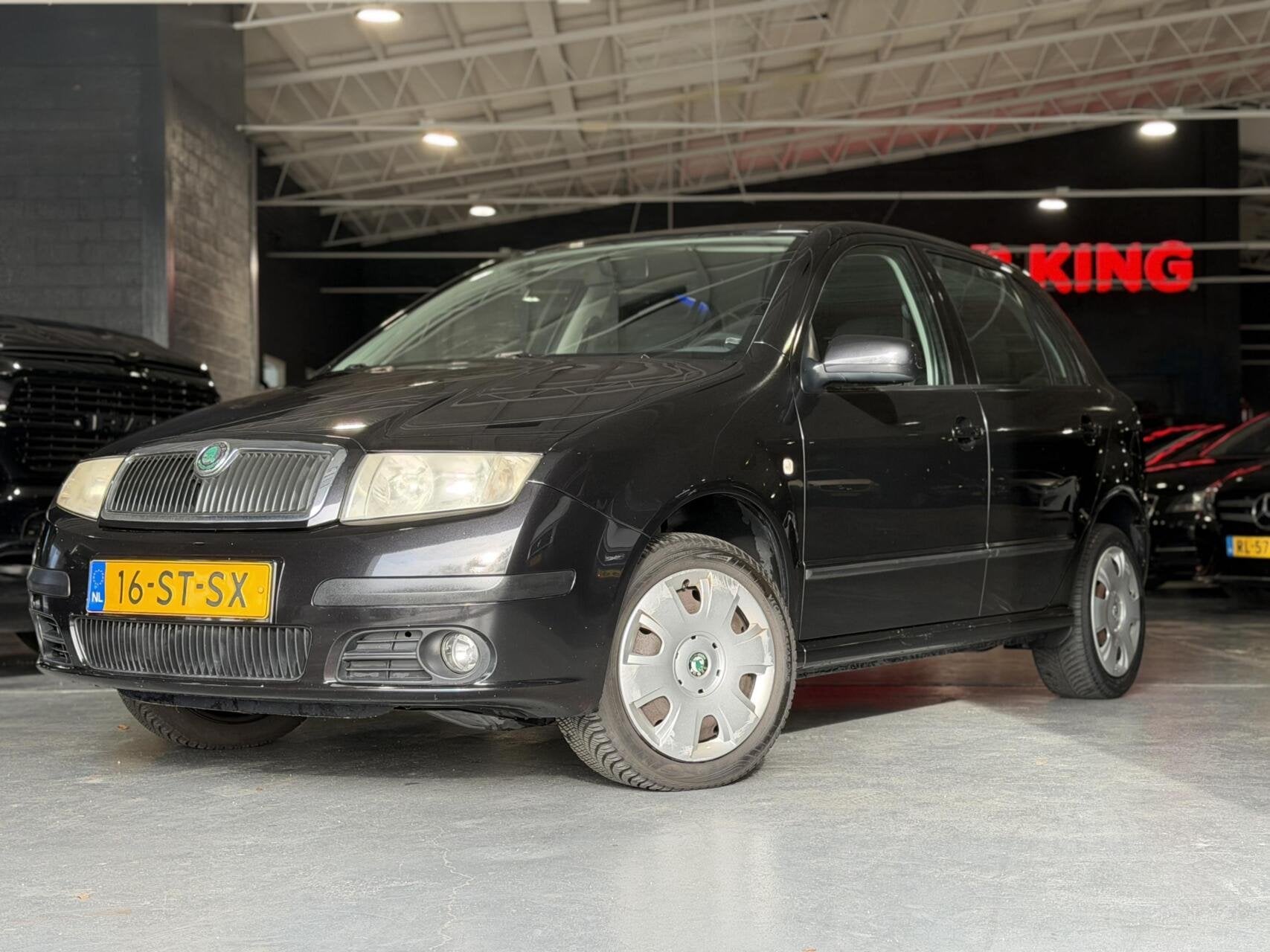 Skoda Fabia 1.4-16V Spirit+ Airco Cruise Trekhaak, Auto's, Voorwielaandrijving, 4 cilinders, Zwart, Origineel Nederlands