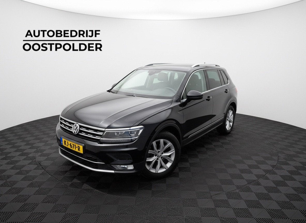 Volkswagen Tiguan 1.4 TSI ACT Highline Automaat, Auto's, 4 cilinders, 150 pk, Alcantara, Zwart