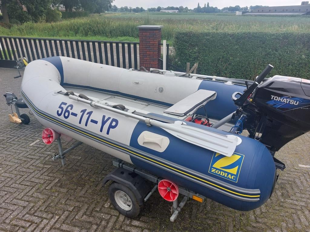Zodiac rubberboot met Tohatsu 20pk motor en trailer, Watersport en Boten, Rubberboten, Ophalen, Benzine, Minder dan 70 pk, Overige materialen