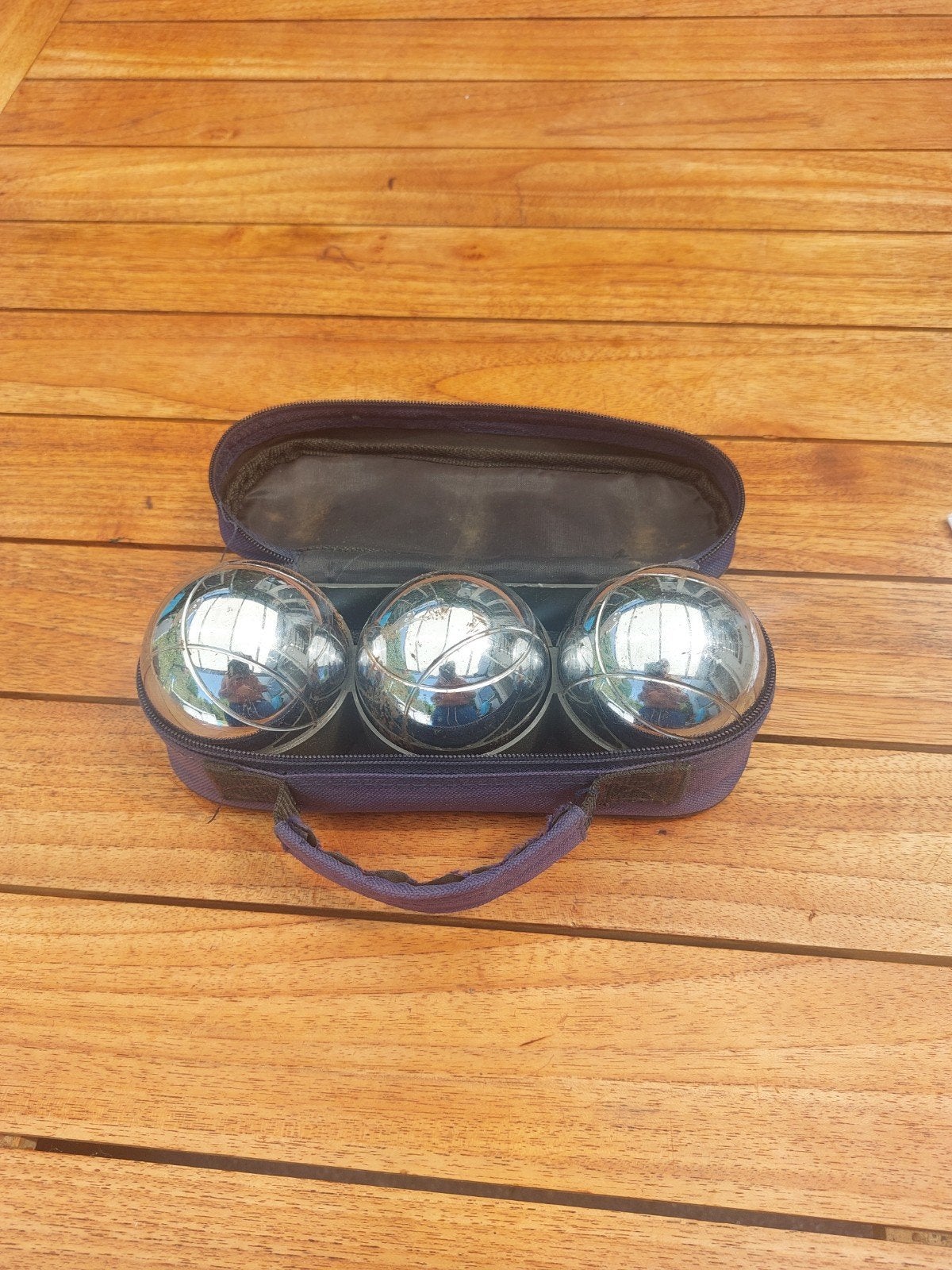 Jeu de Boules ballen., Ophalen