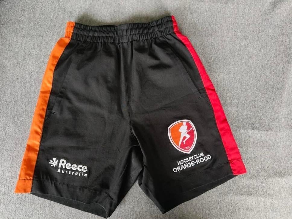 Reece Australia Hockeybroekje HC Oranje-Rood maat 116, Ophalen of Verzenden, Zo goed als nieuw, Kleding