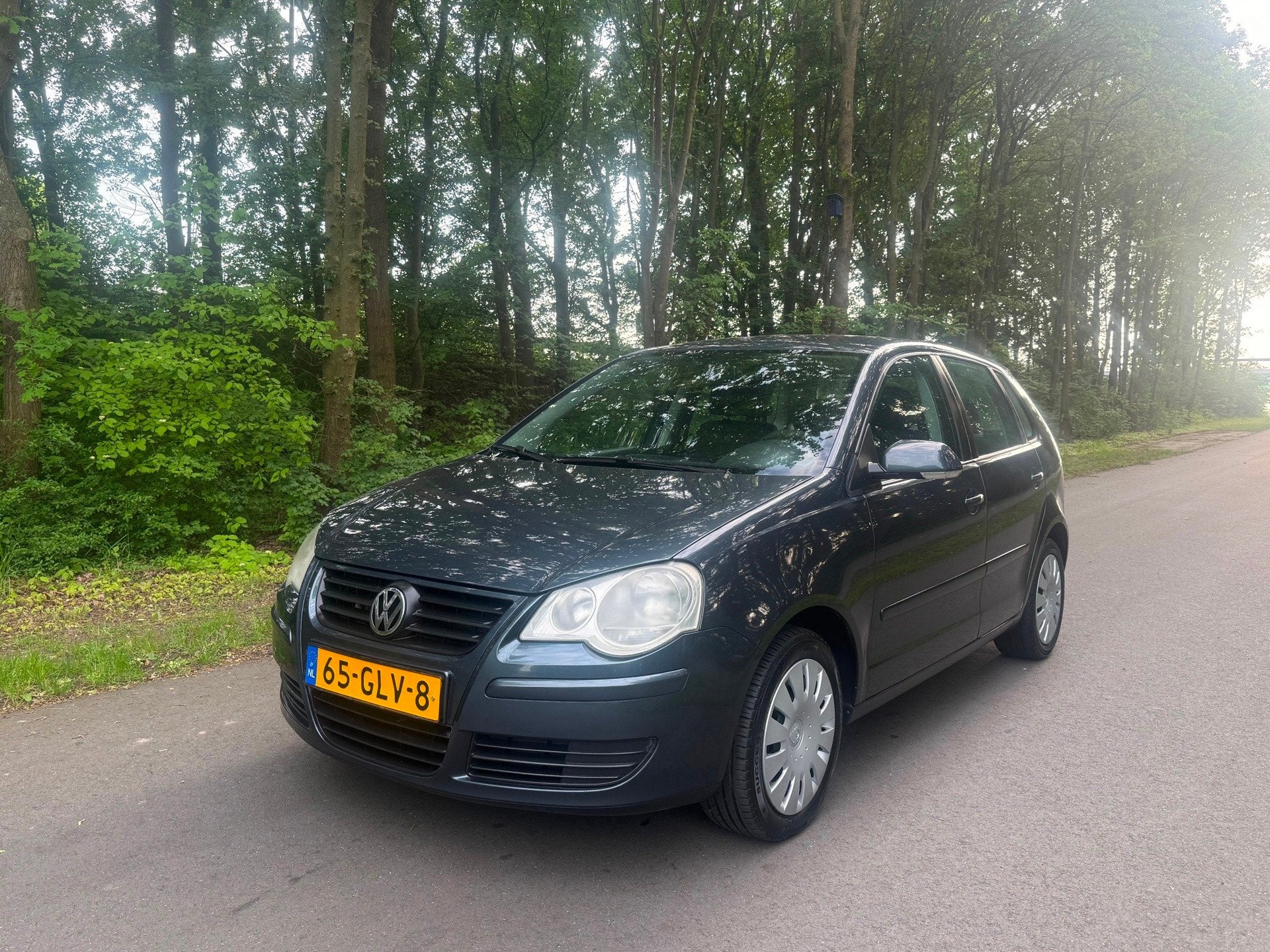 Volkswagen Polo 1.4-16V Comfortline, 4-deurs, airco, Versnel, Auto's, Voorwielaandrijving, 4 cilinders, Blauw, Bedrijf