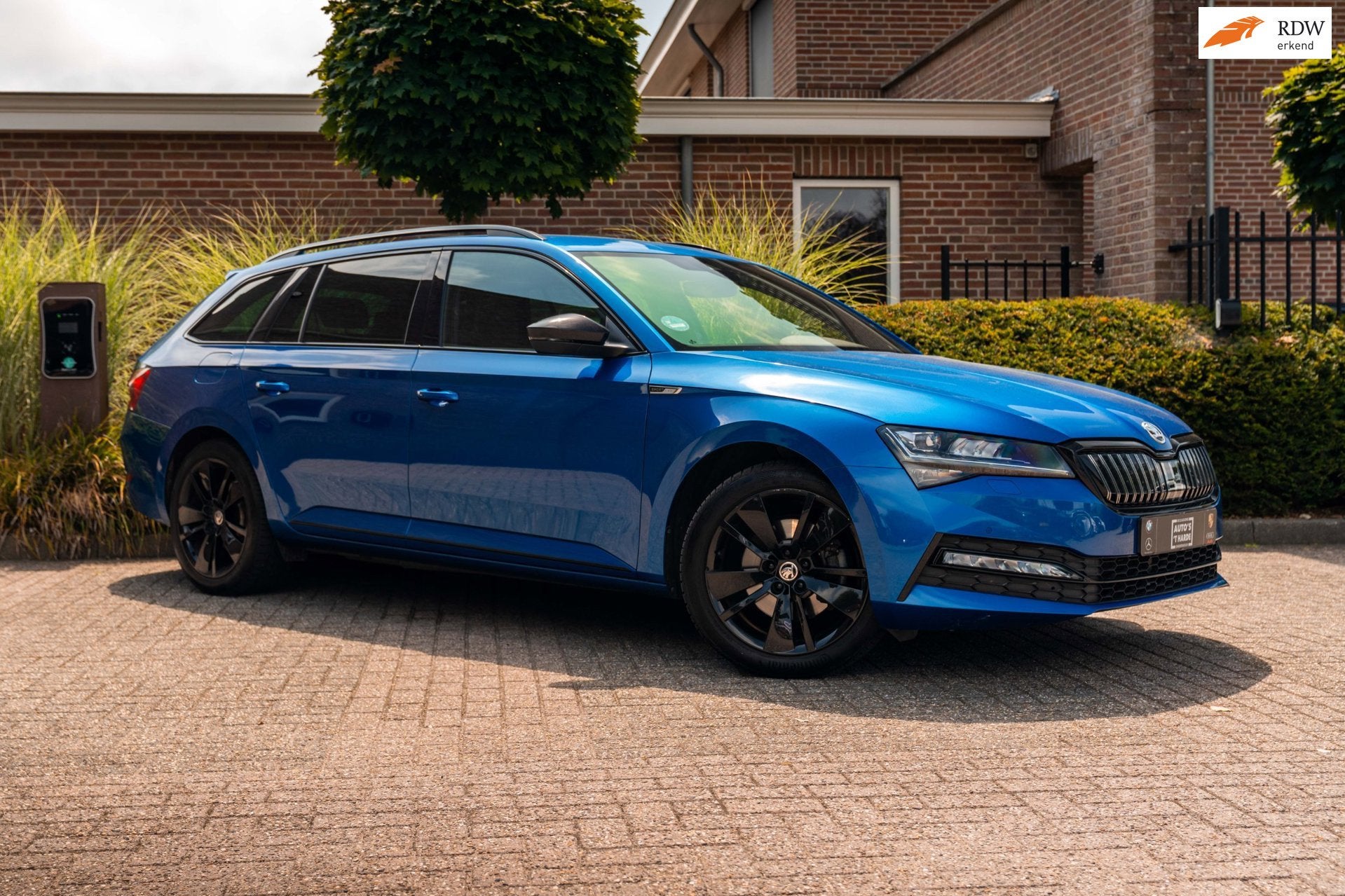 Skoda Superb Combi 1.4 TSI iV Sportline Business 218 PK Elek, Auto's, Skoda, Gebruikt, Blauw, Automatische klimaatregeling, Plug-in hybride
