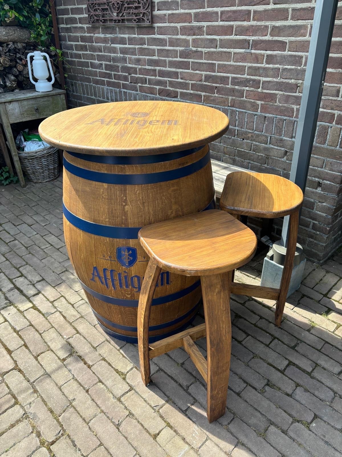 Affligem bierton tafel met 2 krukken, Ophalen, Gebruikt, Inclusief barstoelen