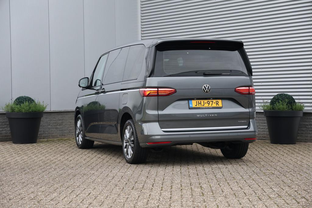 Volkswagen Multivan 1.4 eHybrid L1H1 Style 7P 218PK Elektris, Auto's, Gebruikt, 7 stoelen, Hybride Elektrisch/Benzine, 1600 kg