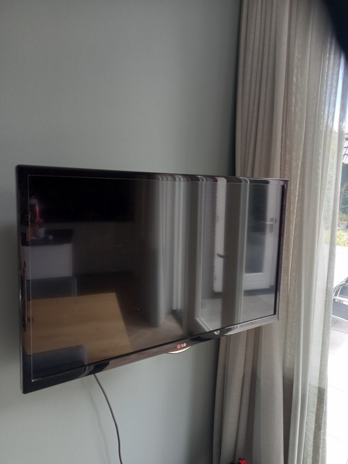 LG TV 32inch, Ophalen