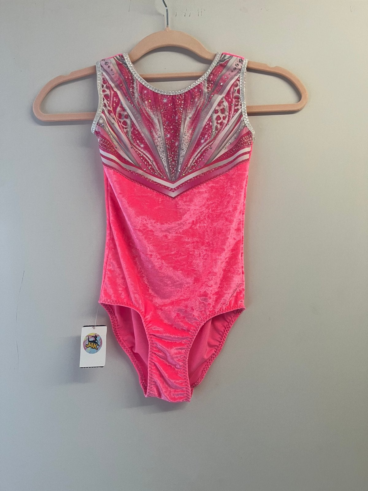 Nieuw turnpakje maat 128 - zacht velours roze neon glitters, Kindermaat 122 t/m 140, Ophalen of Verzenden, Nieuw, Turnpak(je)
