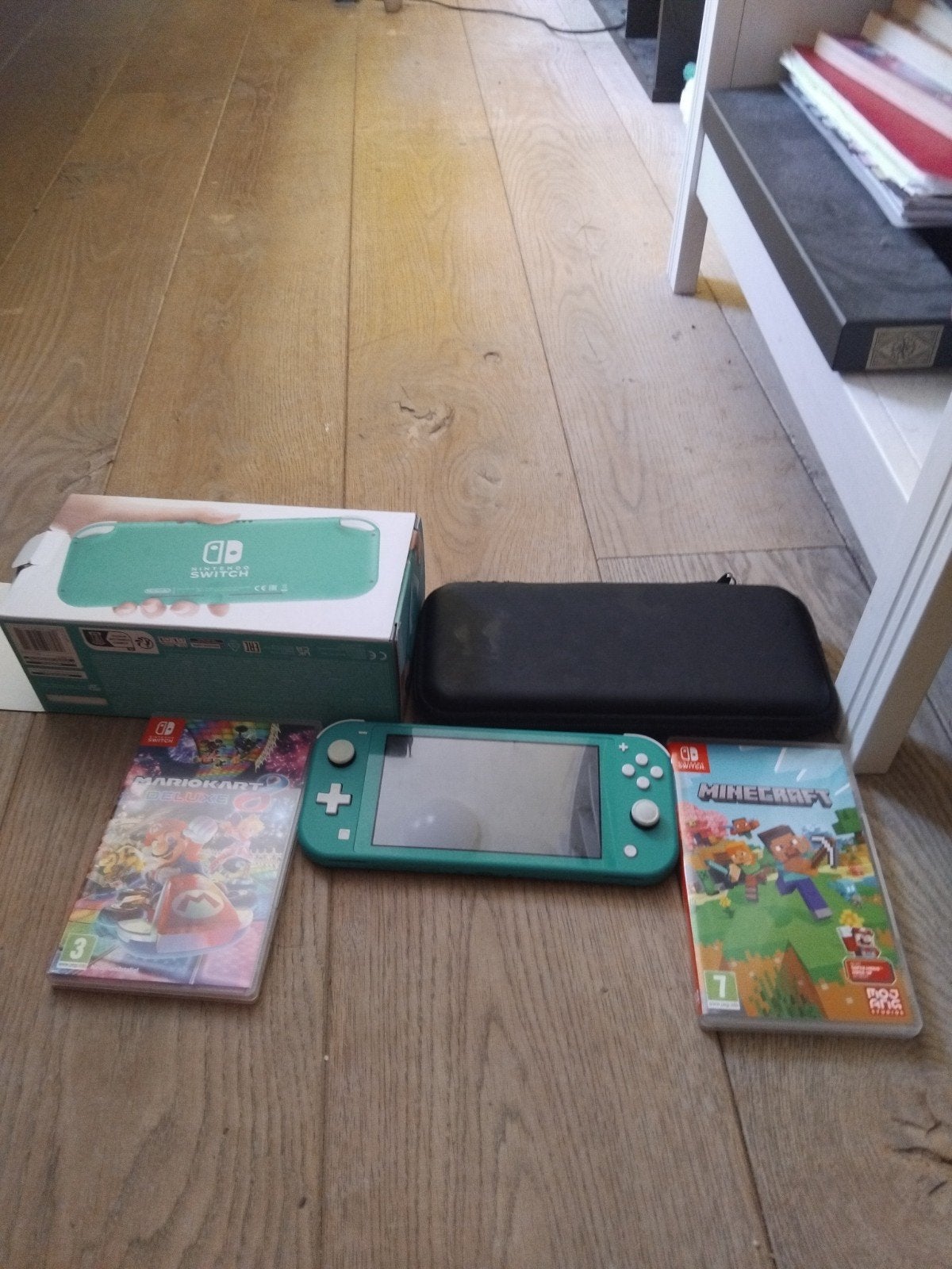 Nintendo Switch Lite complete set, Spelcomputers en Games, Spelcomputers | Nintendo Switch Lite, Gebruikt, Turquoise, Met beschermhoes of tas