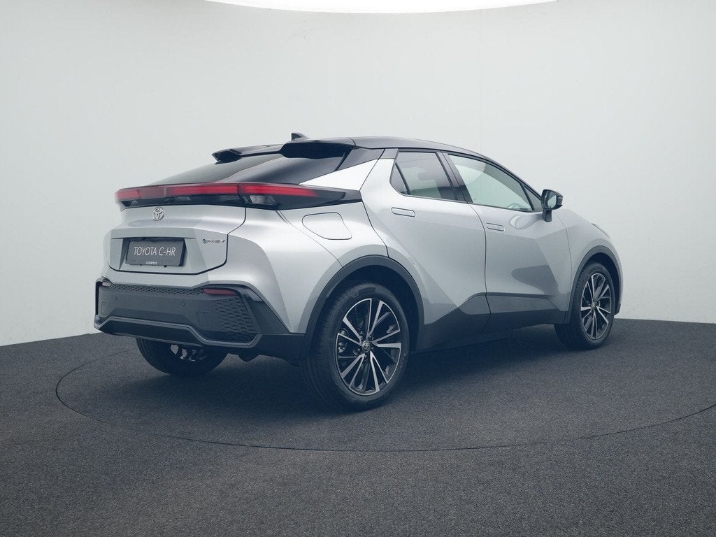 Toyota C-HR 2.0 Plug-in Hybrid 220 Executive *NIEUW*, Auto's, Toyota, 12 maanden, 725 kg, 4 cilinders, Leder en Stof