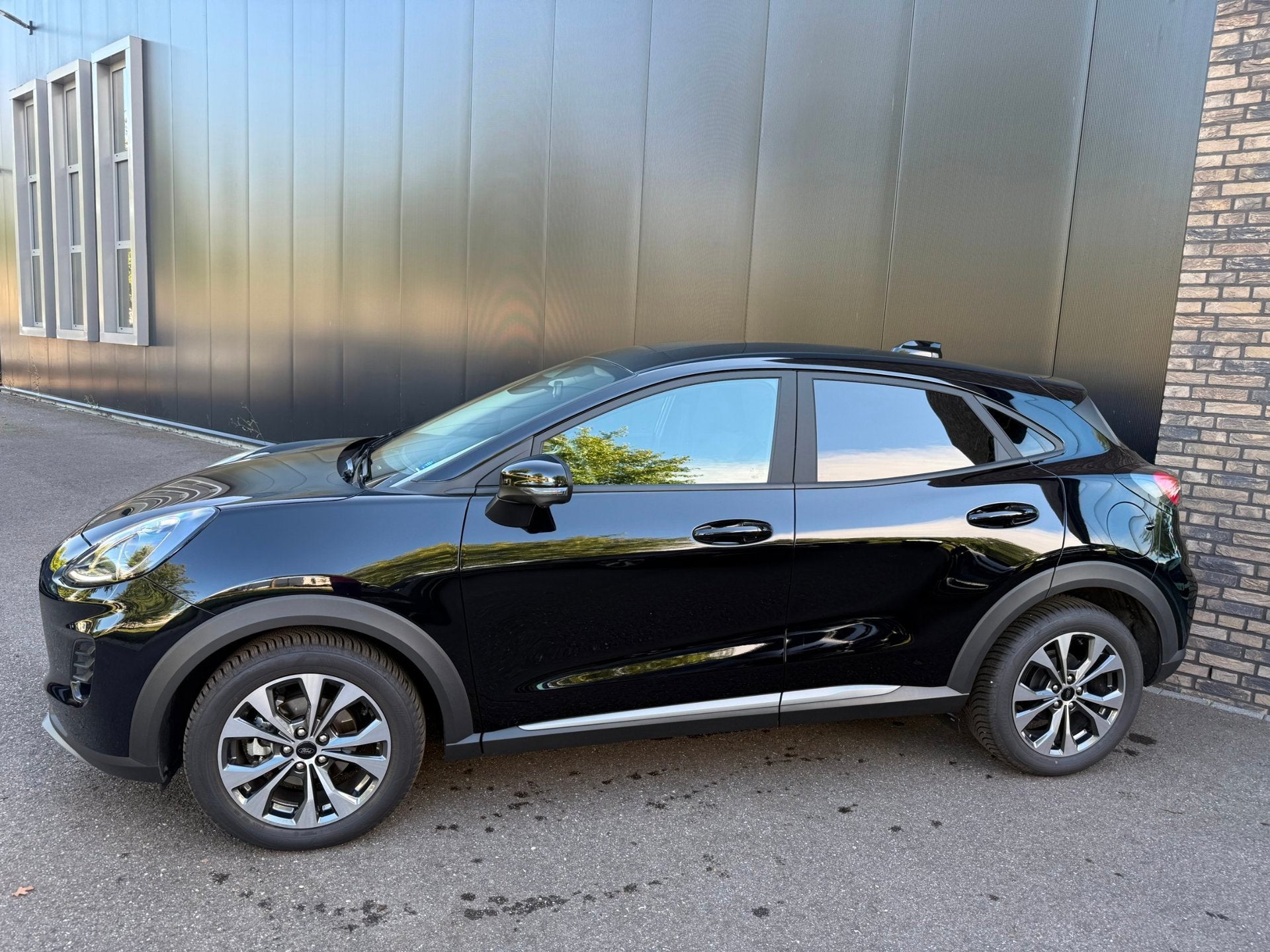 Ford Puma 1.0 Eco 125pk AUT. Titanium Navi, Winter, 360-grad, Auto's, Dealer onderhouden, Zwart, Zwart, Particulier