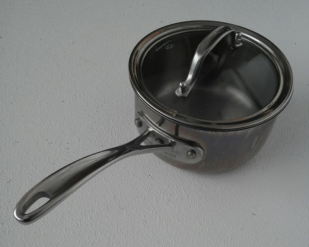 Calphalon tri-ply steelpan met glazen deksel, Ophalen of Verzenden, Zo goed als nieuw, Rvs