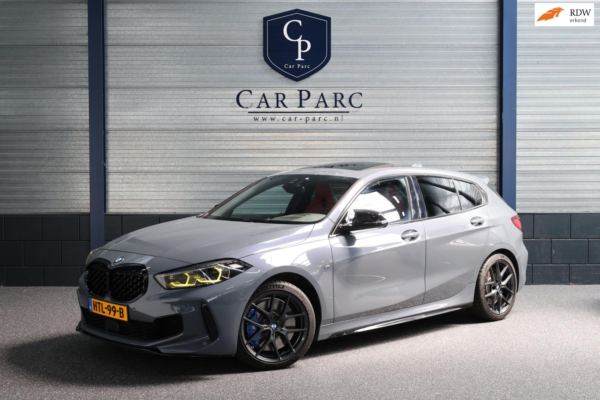 BMW 1-serie M135i xDrive 306+PK M-PERFORMANCE/LED/VIRTUAL/SF, Auto's, Gebruikt, Euro 6, 4 cilinders, Leder