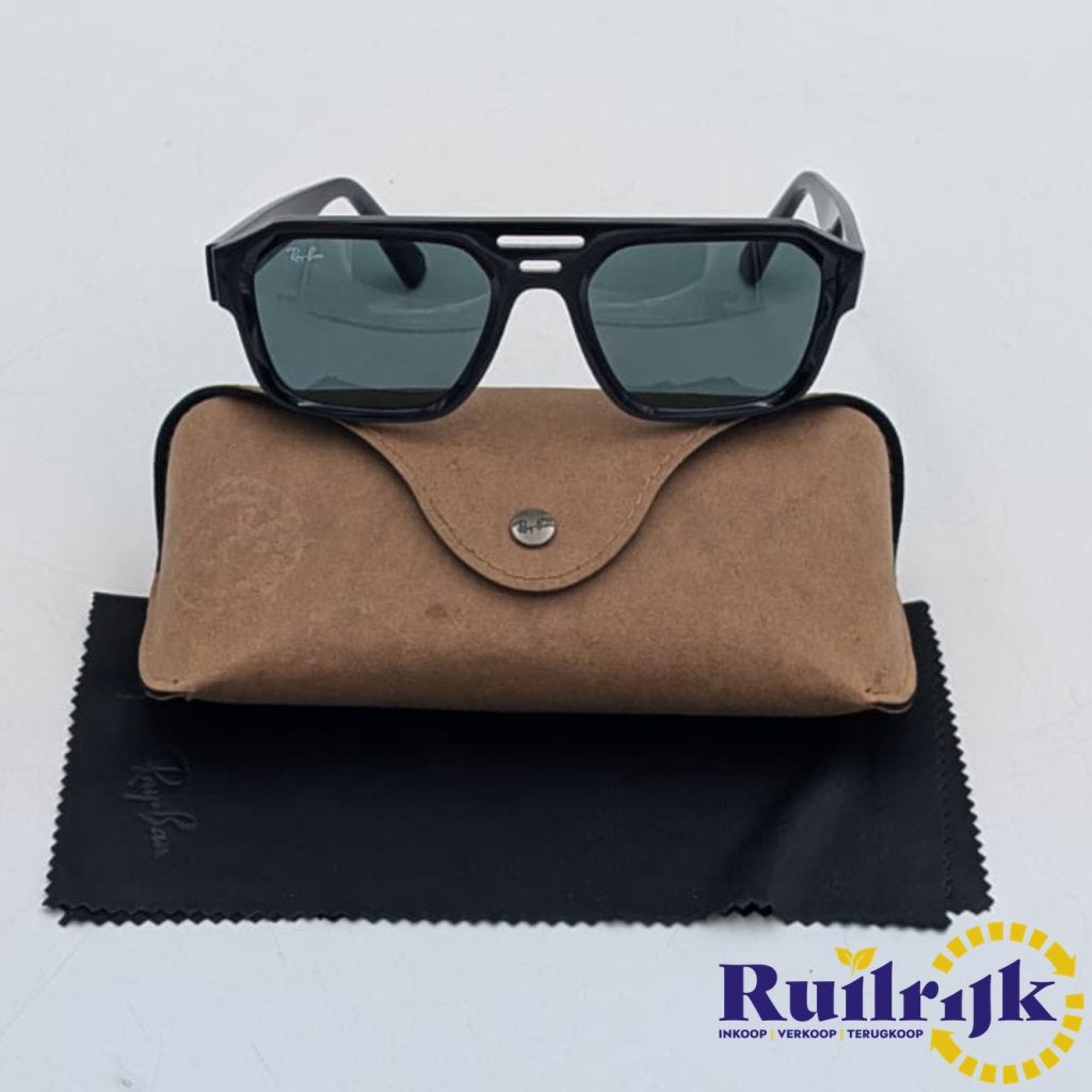 Rayban RB 4397 Corrigan Zwarte Zonnebril - Nette staat, Ray-Ban, Zo goed als nieuw, Support@rayban.com, Luxottica Group, 2 Via S. Marco
Milan 20121
Italy