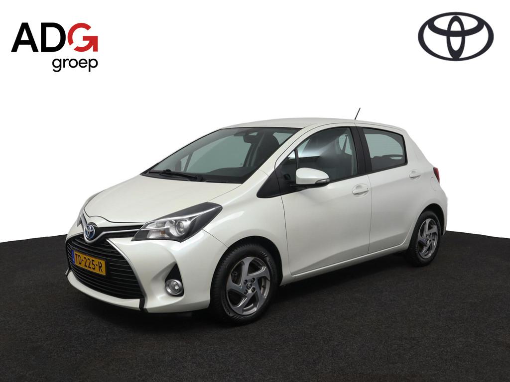 Toyota Yaris 1.5 Hybrid Lease | Airco | Cruise Control | Nav, Auto's, Gebruikt, 4 cilinders, Bedrijf, Hybride Elektrisch/Benzine