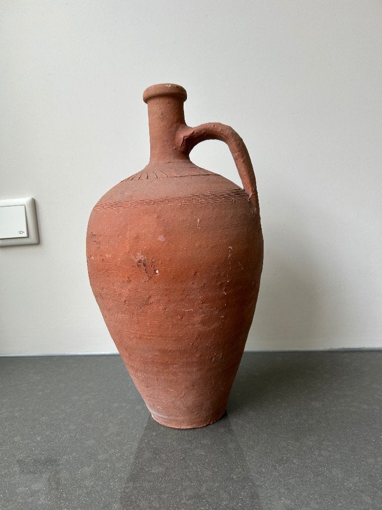 terracotta kruik, Ophalen
