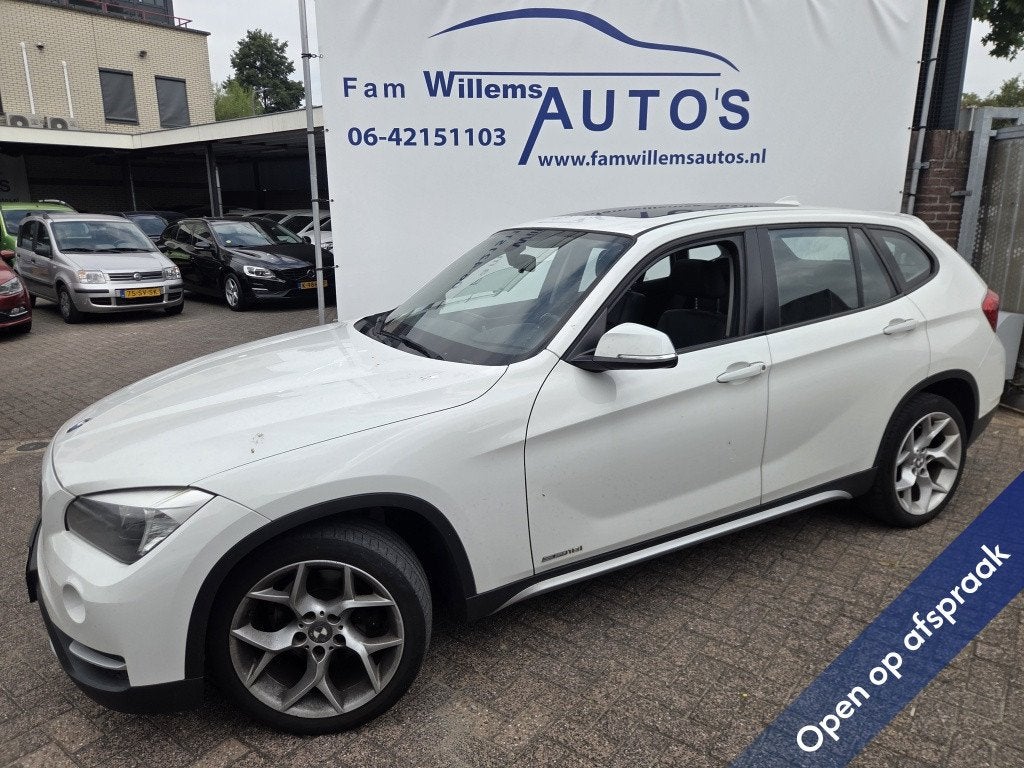 BMW X1 sDrive18i (bj 2013), Auto's, BMW, Achterwielaandrijving, 4 cilinders, 150 pk, Leder en Stof