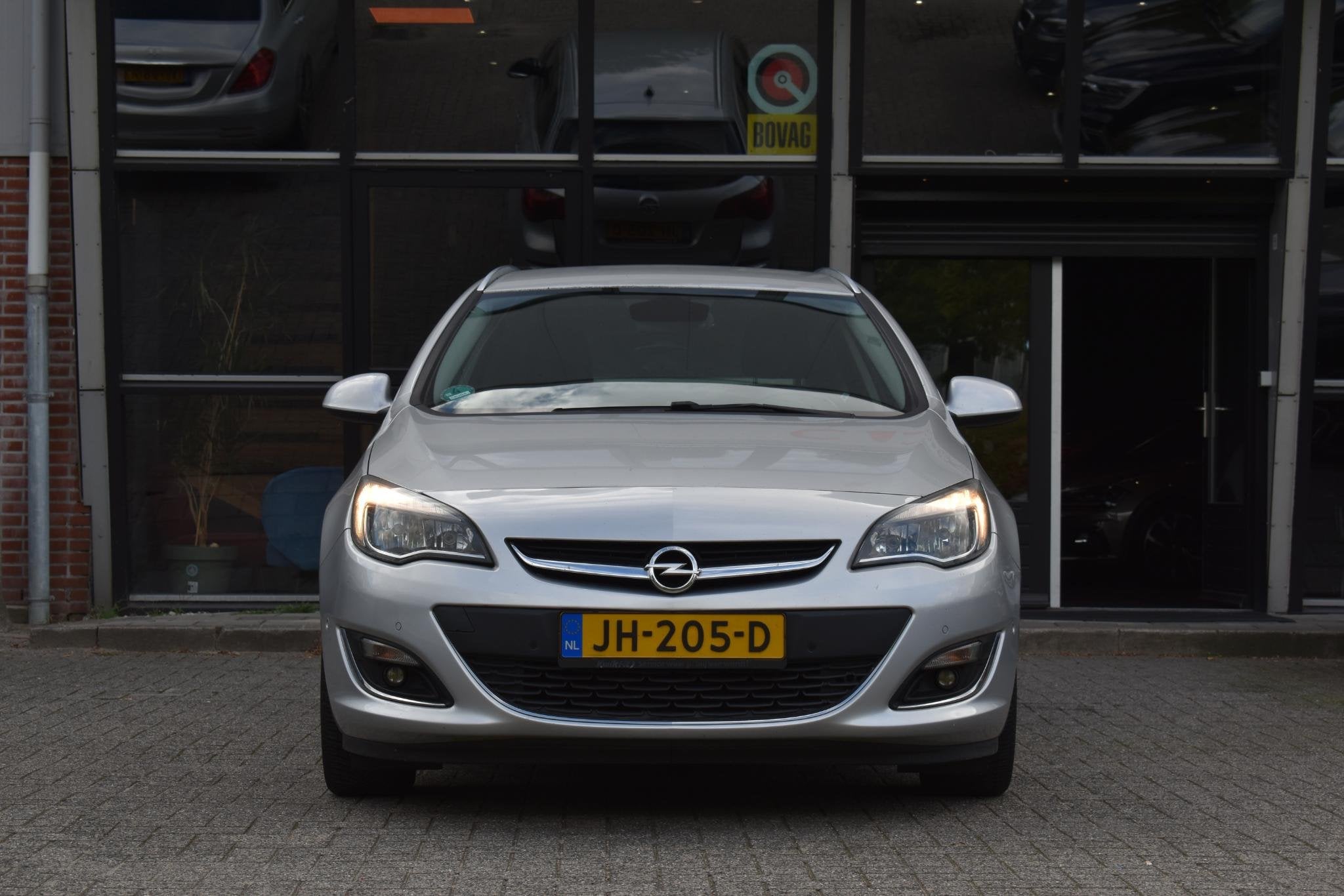 Opel Astra Sports Tourer 1.4 Turbo Sport Camera Cruise Trekh, Auto's, Voorwielaandrijving, Stof, Gebruikt, 4 cilinders