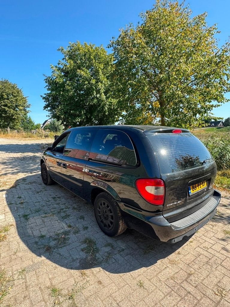 Chrysler Grand Voyager 3.3 2005 Zwart 7 persoons, Auto's, Chrysler, 3301 cc, 450 kg, Grand Voyager, 7 stoelen