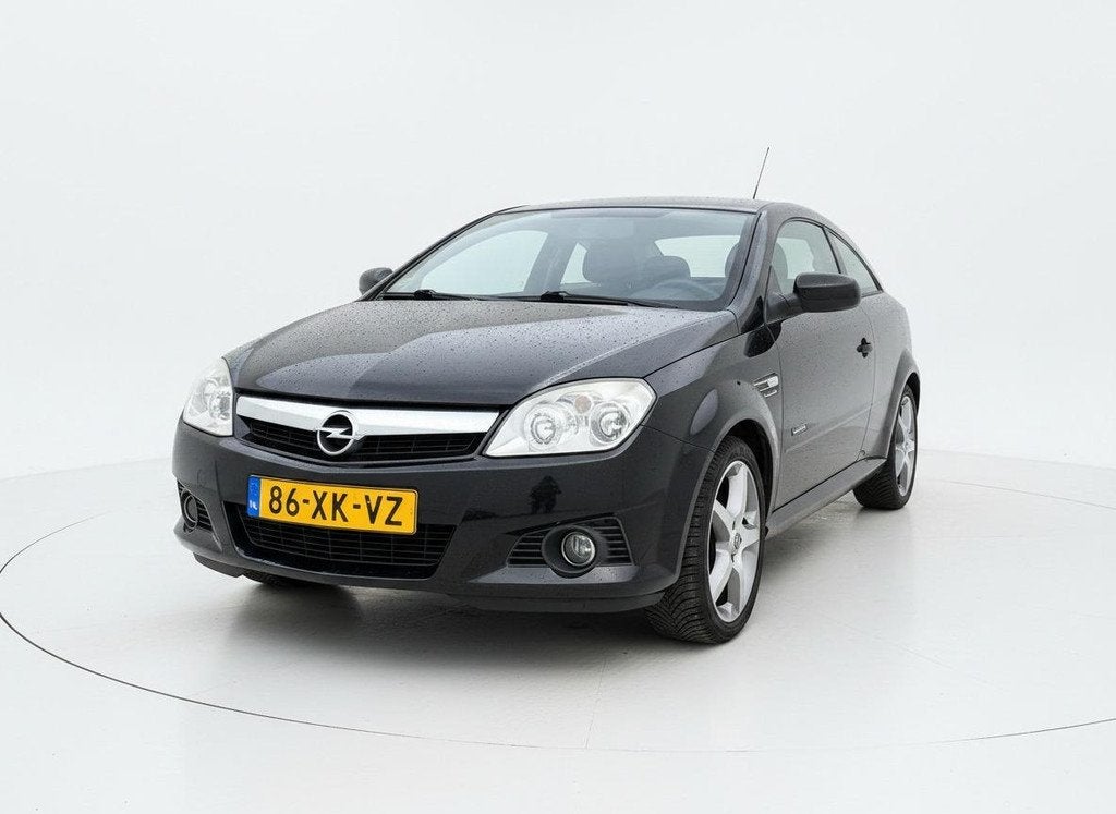 Opel Tigra TwinTop 1.4-16V Temptation LEER - AIRCO - STOELVE, Auto's, Opel, Voorwielaandrijving, Gebruikt, 4 cilinders, Cabriolet