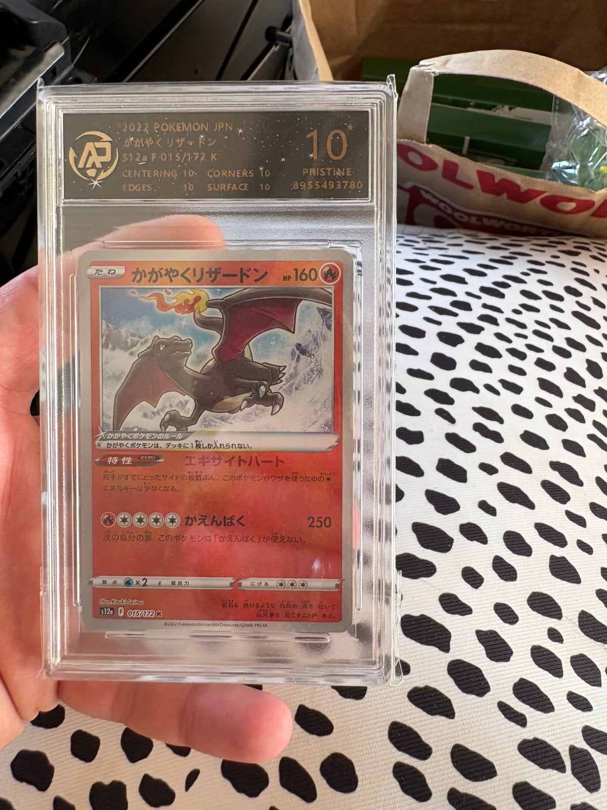 Charizard grade 10, Hobby en Vrije tijd, Verzamelkaartspellen | Pokémon, Ophalen of Verzenden, Zo goed als nieuw, Meerdere kaarten