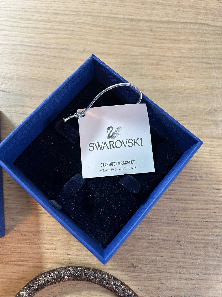 Swarovski Stardust Bracelet Armband Bruin/Goud, Sieraden, Tassen en Uiterlijk, Ophalen of Verzenden, Zo goed als nieuw, Leer