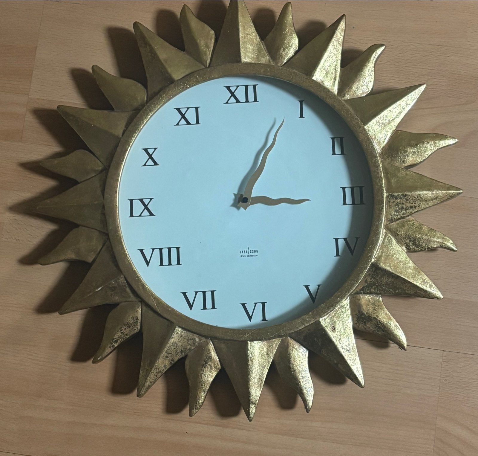 Gouden zonnewijzer wandklok met Romeinse cijfers, Ophalen