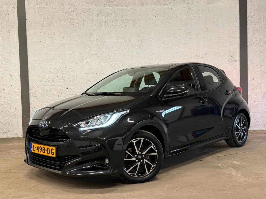 Toyota Yaris 1.5 Hybrid Dynamic 2021 NAP LED CARPLAY CAMERA, Met garantie (alle), Bedrijf, Grijs, Hybride Elektrisch/Benzine