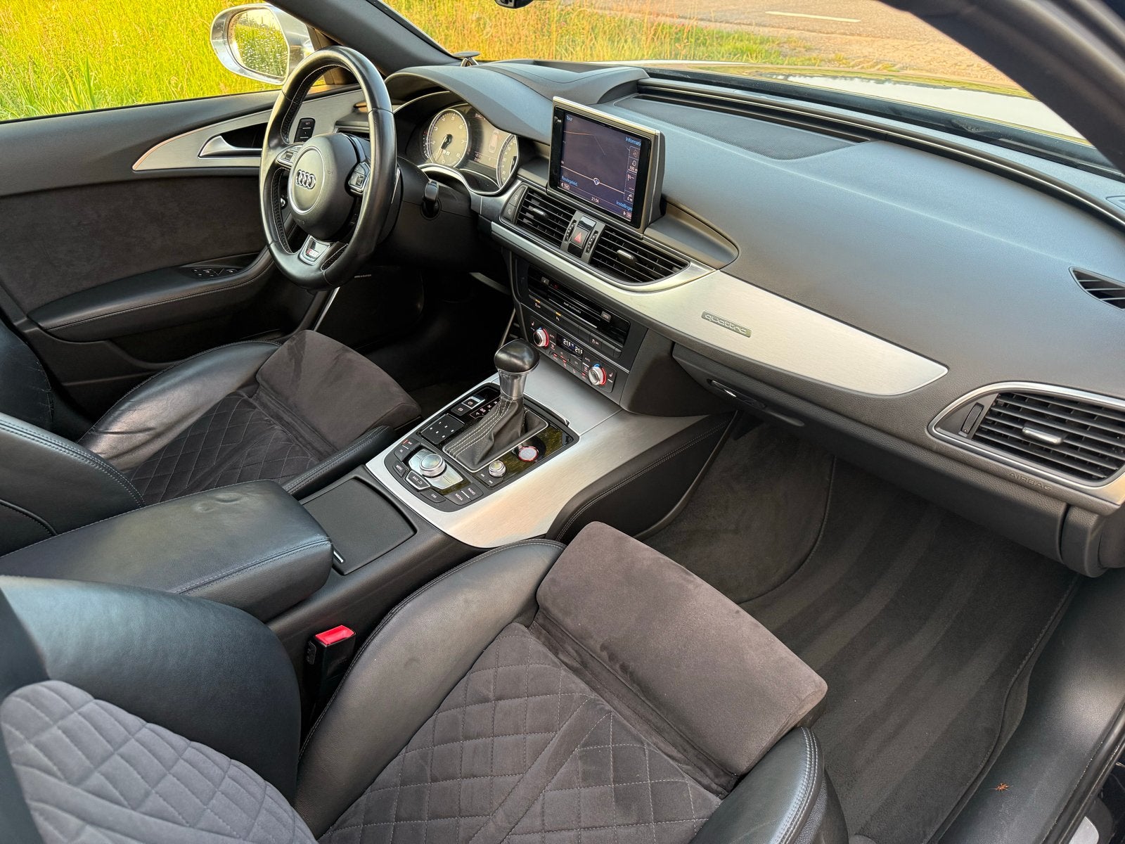 Foto 8 van Audi S6 420pk Quattro S Tronic 2012 Zwart