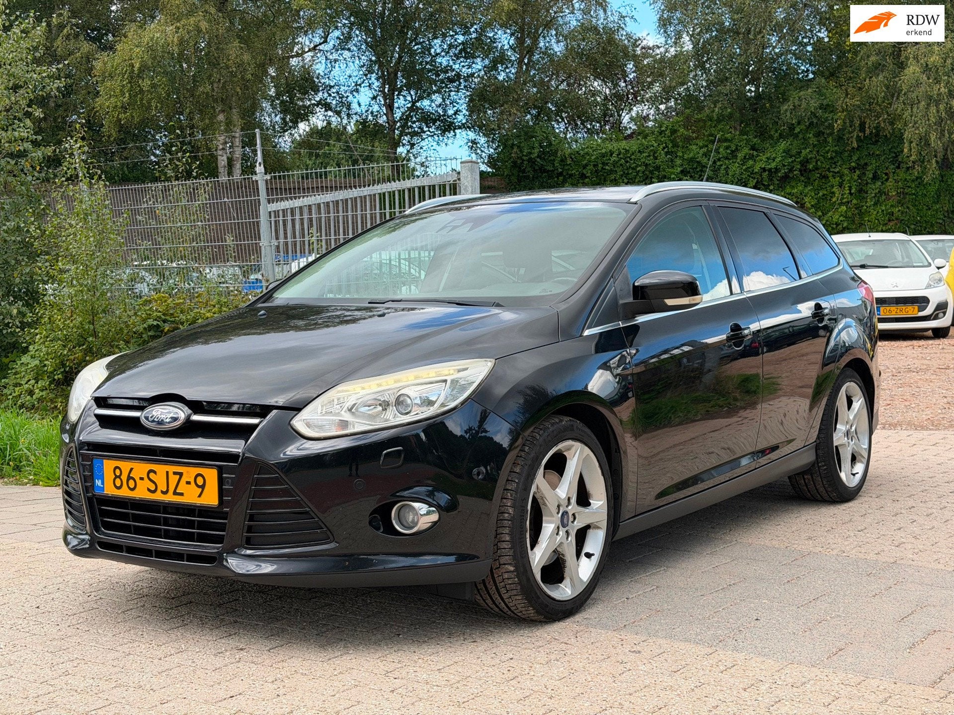 Ford Focus Wagon 1.6 EcoBoost Titanium, Auto's, 1258 kg, 4 cilinders, 150 pk, Zwart