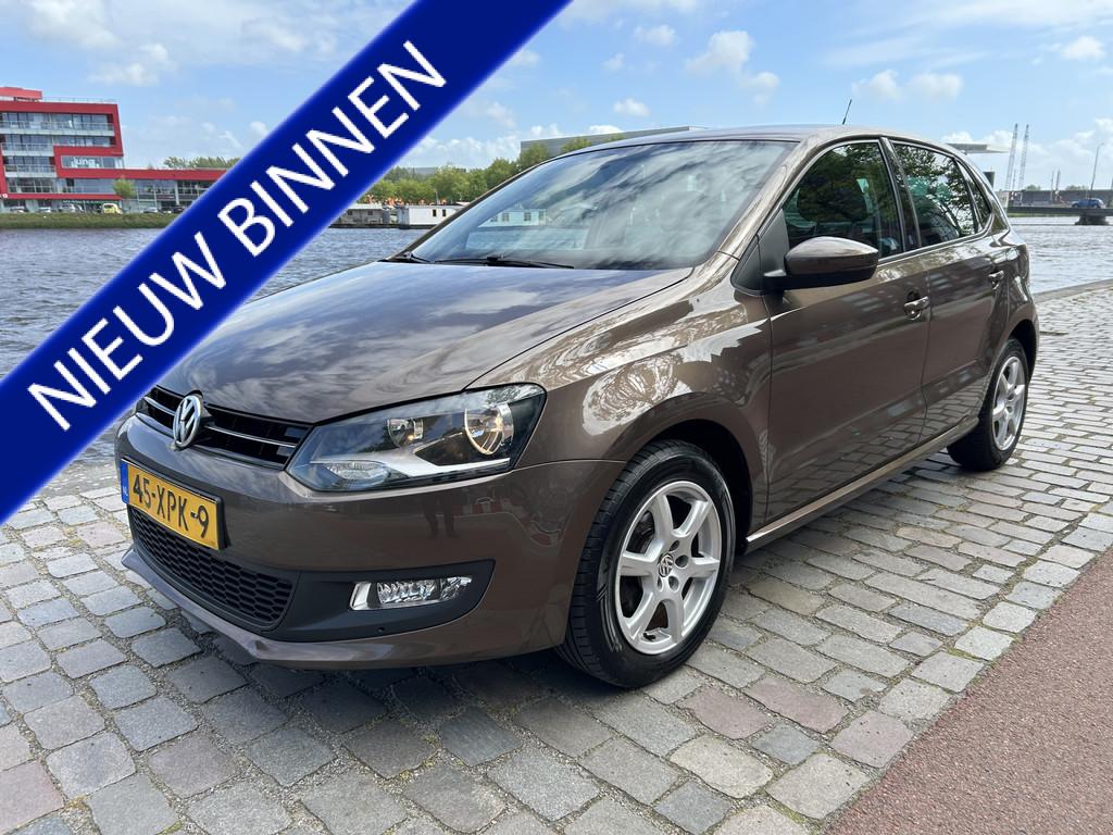 Volkswagen Polo 1.2 TSI BlueMotion Comfortline 5-drs Airco N, Auto's, Voorwielaandrijving, Euro 5, Stof, Bruin