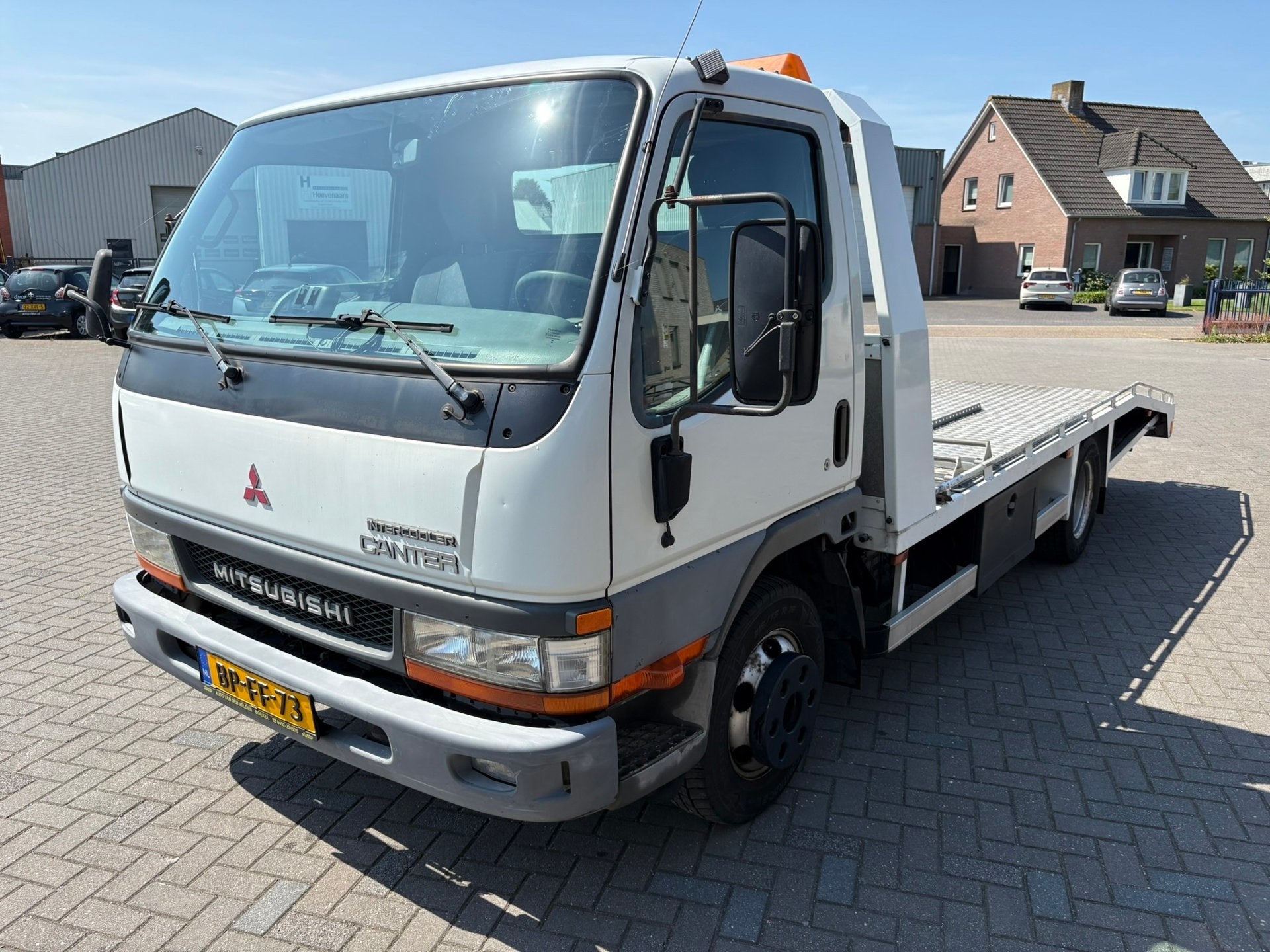 Mitsubishi Canter FE649 Oprijwagen 2004 - met lage km-stand, Auto's, Achterwielaandrijving, 143 pk, Wit, Mitsubishi