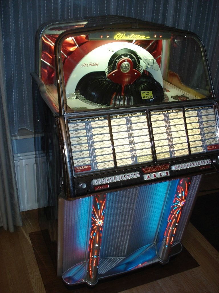 Jukebox Wurlitzer 1800 uit 1955 inc Compleet met Singels, 1950 tot 1960, Zo goed als nieuw, Wurlitzer, Ophalen