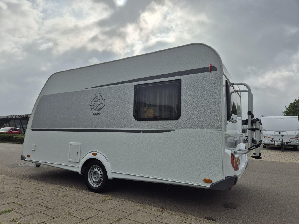 Knaus Sport 420 QD, Caravans en Kamperen, Bedrijf, Treinzit, 750 - 1000 kg, Ringverwarming