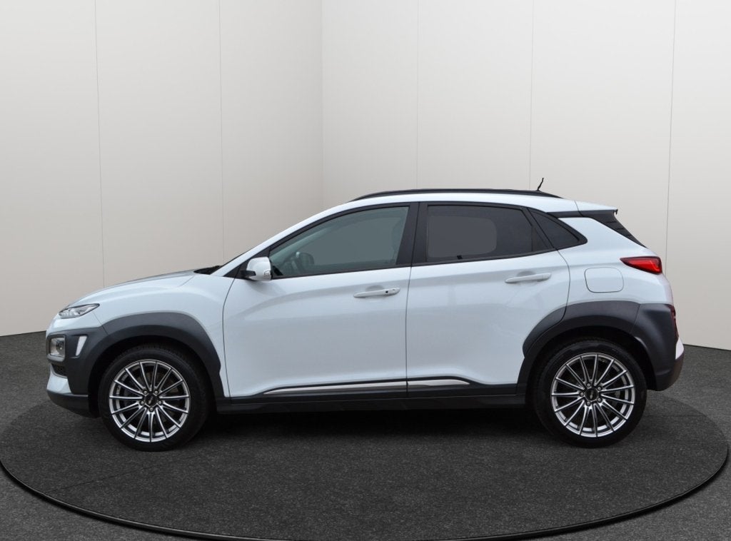 Hyundai KONA 1.6 T-GDI Premium 4WD 177PK Leer/Camera/HUD, Automaat, 4 cilinders, Automatische klimaatregeling, Wit