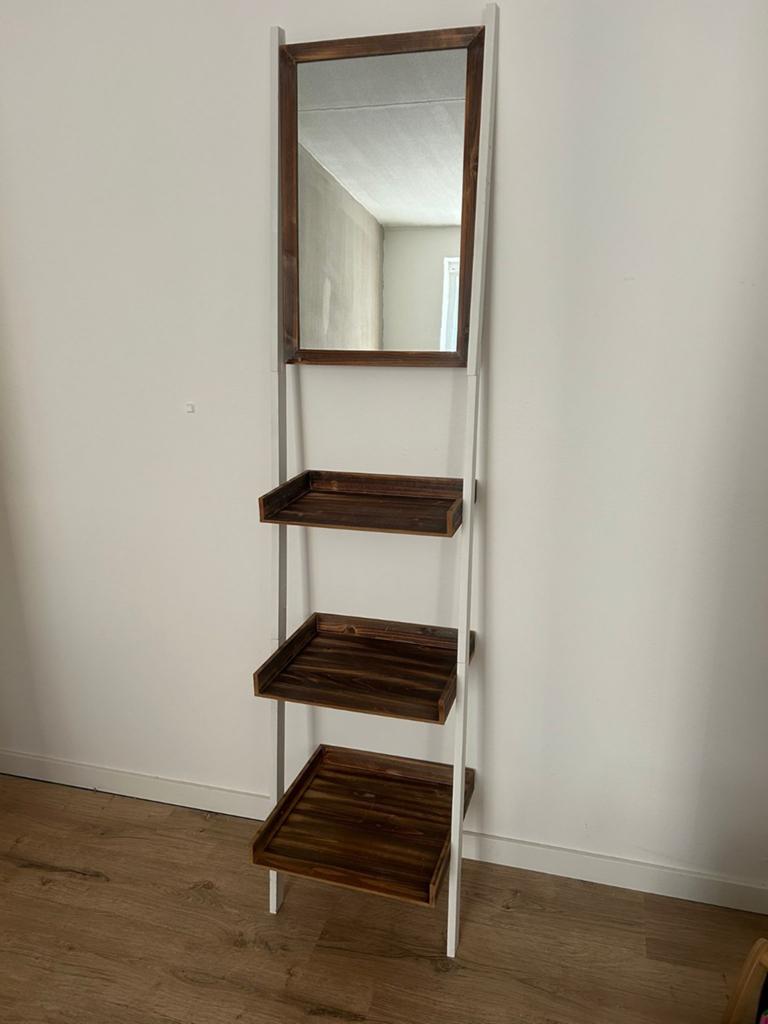 Schuine kast met spiegel, Ophalen