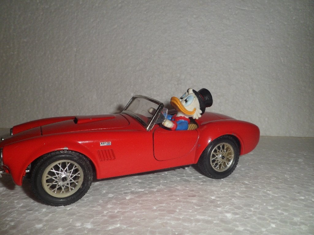 Disney Dagobert- in sportwagen, Verzamelen, Ophalen, Overige figuren, Gebruikt, Beeldje of Figuurtje
