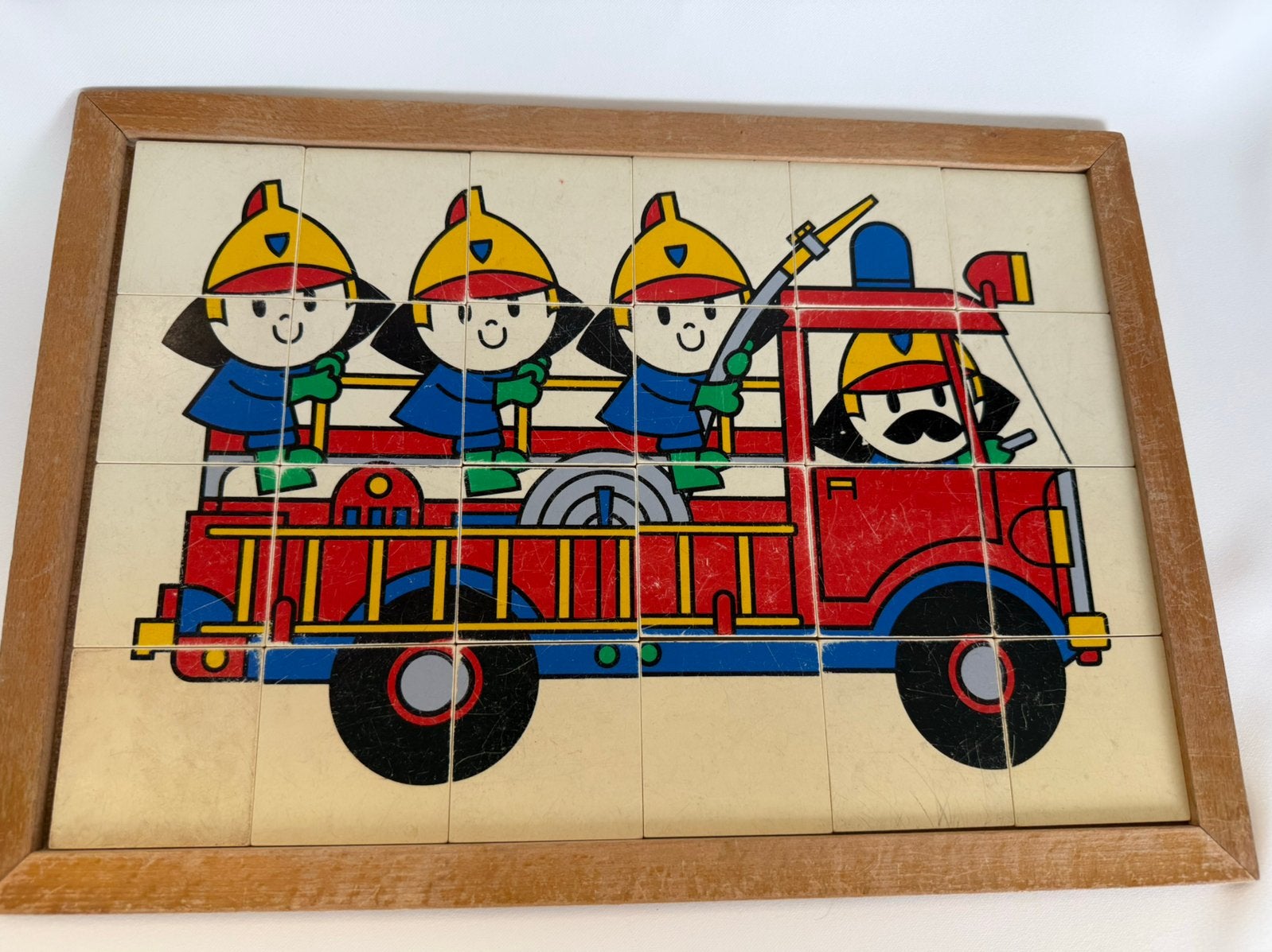 ROLF educatief speelgoed puzzel in frame brandweerauto, Ophalen of Verzenden, 10 tot 50 stukjes, Gebruikt, 6 maanden tot 2 jaar