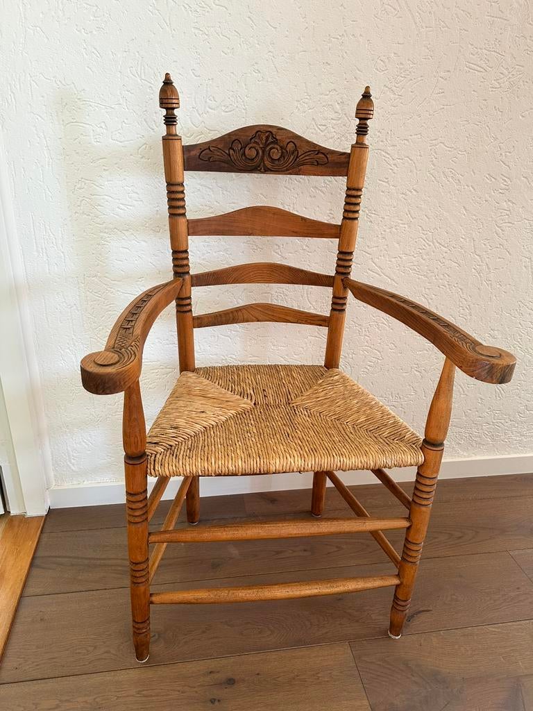 Prachtige oude leunstoel, Ophalen