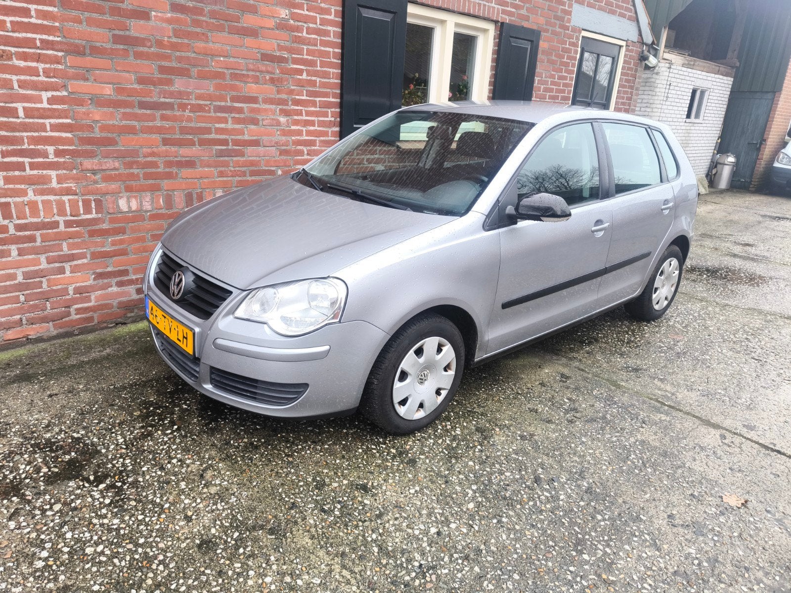 Volkswagen Polo 1.4 16V 59KW 2007 Grijs, Auto's, Voorwielaandrijving, 4 cilinders, Handgeschakeld, Particulier